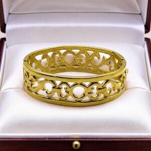 Signed GIVENCHY Vintage 80s Gold Tone Open Work Hinged Bangle Bracelet 7.5” EUC